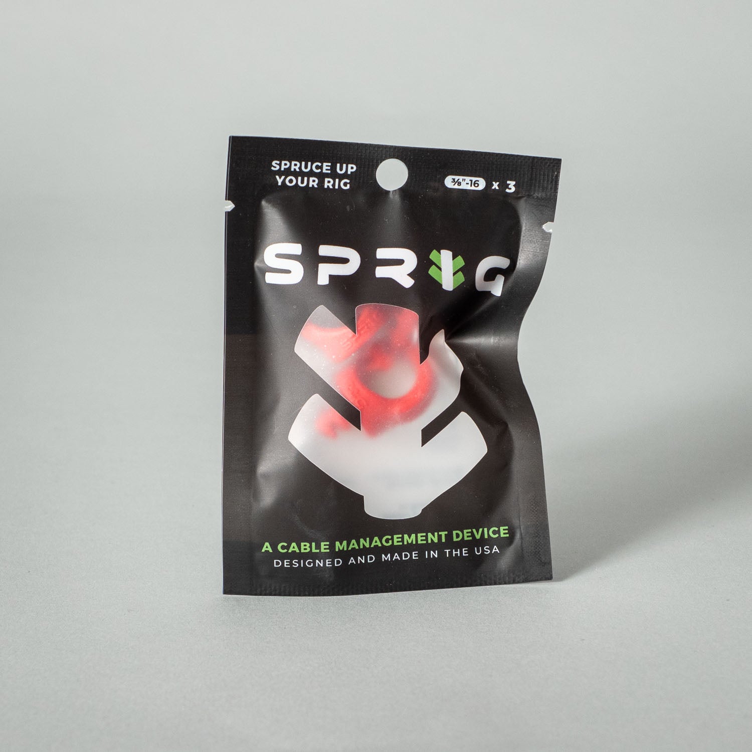 Flexible Kabelclips von setbedarf, grüne und transparente Clips zur sicheren Kabelführung und Organisation.
