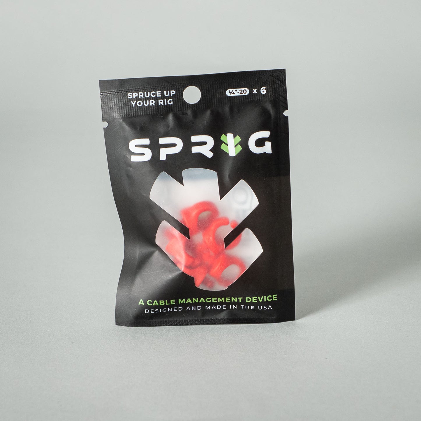 Flexible Kabelclips von setbedarf zum sicheren Fixieren von Kabeln, in verschiedenen Größen, aus flexiblem Kunststoff gefertigt.